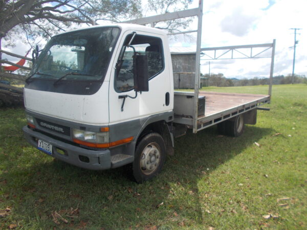 MITSUBISHI CANTER TRAY TRUCK FE657E 5 SPD MANUAL 4 CYL DIESEL $16,500