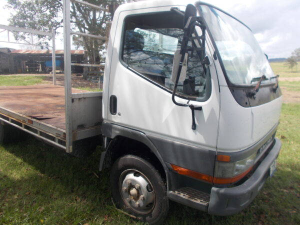 MITSUBISHI CANTER TRAY TRUCK FE657E 5 SPD MANUAL 4 CYL DIESEL $16,500